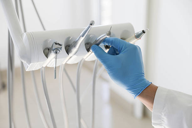 Professional Emergency Dentist technician working in Caney, KS
